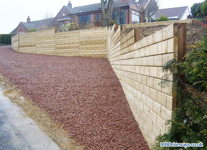fence, fencing, wall, gravel, gravelling, red gravel, retaining wall